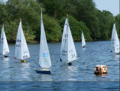 A fleet of IOMs sailing upwind